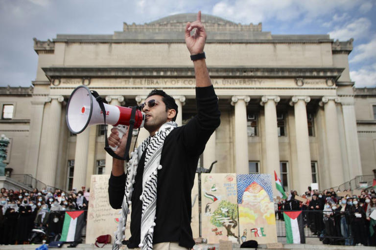 Mohsen Mahdawi speaking during a protest at Columbia University in November 2023.